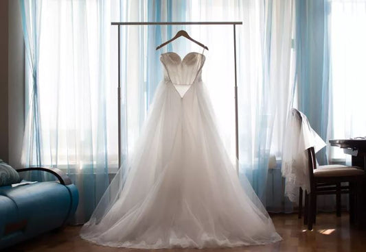 What is the best way to store a wedding dress?